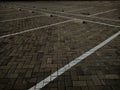 Empty parking spaces outdoor with brick tiles ground Royalty Free Stock Photo