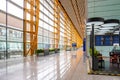 Empty passage with large windows at Beijing Airport. Royalty Free Stock Photo