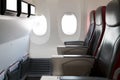 Empty passenger airplane seats in cabin. Interior in modern airplane.. Royalty Free Stock Photo
