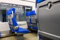 Empty passenger seats in the train car. No passengers in the train car Royalty Free Stock Photo