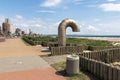 Empty Paved Promenade Against Coastal City Skyline Royalty Free Stock Photo