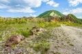 Empty rural road through mountain cliffs Royalty Free Stock Photo