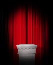 Empty pedestal display on red curtain Royalty Free Stock Photo