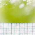 Empty perspective kitchen towel over blurred trees with bokeh background, for product display montage Royalty Free Stock Photo