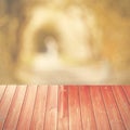 Empty perspective red wood over blurred trees with bokeh background, for product display montage Royalty Free Stock Photo