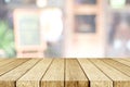 Empty perspective wood, tabletop, over blur restaurant with bokeh light background, food and product display montage background