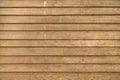 Empty photo of a fence made of wooden boards. Brightly brown background, for layouts and sites Royalty Free Stock Photo