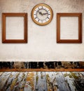 Empty photo frames against an wall in old room Royalty Free Stock Photo