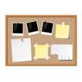 Empty photo frames, paper notes and yellow stickers attached to