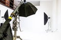 Empty photo studio with lighting equipment. Photographer workplace interior with professional tool set gear. Flash light Royalty Free Stock Photo