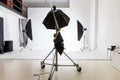 Empty photo studio with lighting equipment. Photographer workplace interior with professional tool set gear. Flash light Royalty Free Stock Photo