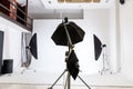 Empty photo studio with lighting equipment. Photographer workplace interior with professional tool set gear. Flash light Royalty Free Stock Photo