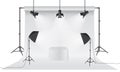 Empty photo studio. Realistic 3D white backdrop paper with tripod mock up design. Gray background. Royalty Free Stock Photo