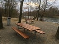 Empty picnic area with garbage can at Aare river Brugg Switzerland in winter Royalty Free Stock Photo