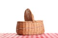 Empty picnic basket on checkered tablecloth Royalty Free Stock Photo