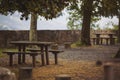 Empty picnic table and chairs in the mountains on a beautiful viewpoint. picnic table at the european mountains. Royalty Free Stock Photo