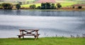 Empty Picnic Table and River Royalty Free Stock Photo