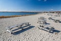Empty picnic tables by the water at Compo Beach in Connecticut Royalty Free Stock Photo