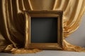 The empty picture frame is adorned with intricate golden silk threads, adding a touch of elegance and sophistication to the Royalty Free Stock Photo