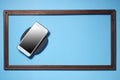 Empty Picture frame with Smartphone mockup Royalty Free Stock Photo