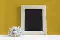 Empty picture frame on yellow background Royalty Free Stock Photo