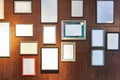 Blank picture frames on a wall gallery