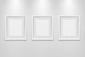 Empty picture frames on the wall with light effect Royalty Free Stock Photo
