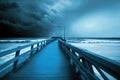 Empty pier and ocean with dark clouds in the evening. Generative AI