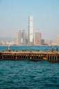 Empty pier with ocean and skyscraper city skyline backgroud, HongKong