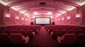 Empty pink cinema hall. View of empty cinema screen with rpink chairs. Royalty Free Stock Photo