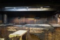 Empty pit room of old Texas BBQ Meat Market in West Texas, Ameri Royalty Free Stock Photo