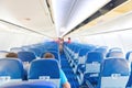 Empty plane interior with few people Royalty Free Stock Photo