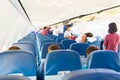 Empty plane interior with few people