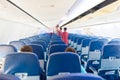 Empty plane interior with few people Royalty Free Stock Photo