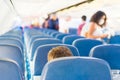 Empty plane interior with few people Royalty Free Stock Photo