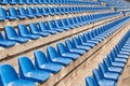 Empty plastic blue seats Royalty Free Stock Photo
