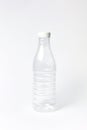 Empty plastic bottle mock up for water on a light background. Royalty Free Stock Photo