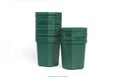 Empty plastic green flower pots isolated on white background Royalty Free Stock Photo