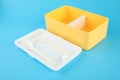 Empty plastic lunch box with cutlery on light blue background Royalty Free Stock Photo