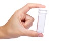 Empty plastic medical pharmaceutical sterile ampule bottle in hand isolated on the white background, transparent container