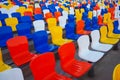 Empty plastic seats at football stadium