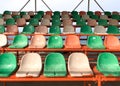 Plastic chairs in the stadium. Royalty Free Stock Photo