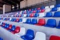 Empty plastic seats at the sport stadium Royalty Free Stock Photo