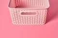 Empty plastic square basket with handles for washing for keeping clear or messy clothes at home or laundry Royalty Free Stock Photo