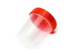 empty plastic urine jar isolated on red background. close up Royalty Free Stock Photo