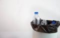 Empty plastic water bottle in recycling bin waiting to be taken to recycle. Concept save the earth Royalty Free Stock Photo