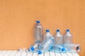 Empty plastic water bottles on table Royalty Free Stock Photo