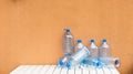 Empty plastic water bottles on table Royalty Free Stock Photo