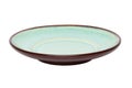 Empty plate background. A decorative brown and green plate isolated on a white background. Kitchen ware Royalty Free Stock Photo