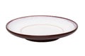 Empty plate background. A decorative brown and white plate isolated on a white background. Kitchen ware Royalty Free Stock Photo